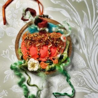 Orange felt Pumpkin on a 3" embroidery hoop