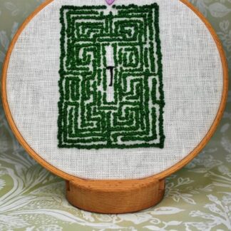 Embroidered Overlook Hotel Maze on a 7" hoop sewn with lots of french knots