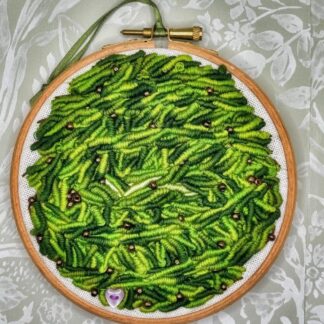 A Chinese Thumb print tea plantation sewn on a 5"embroidery hoop