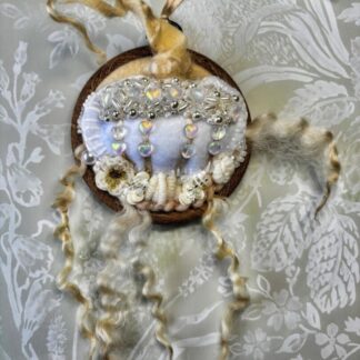 White felt Pumpkin on a 3" embroidery hoop