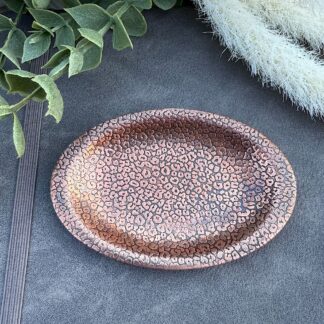 Copper trinket dish with leopard print pattern