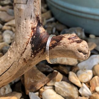 Large hammered sterling silver hoop earrings made from recycled silver