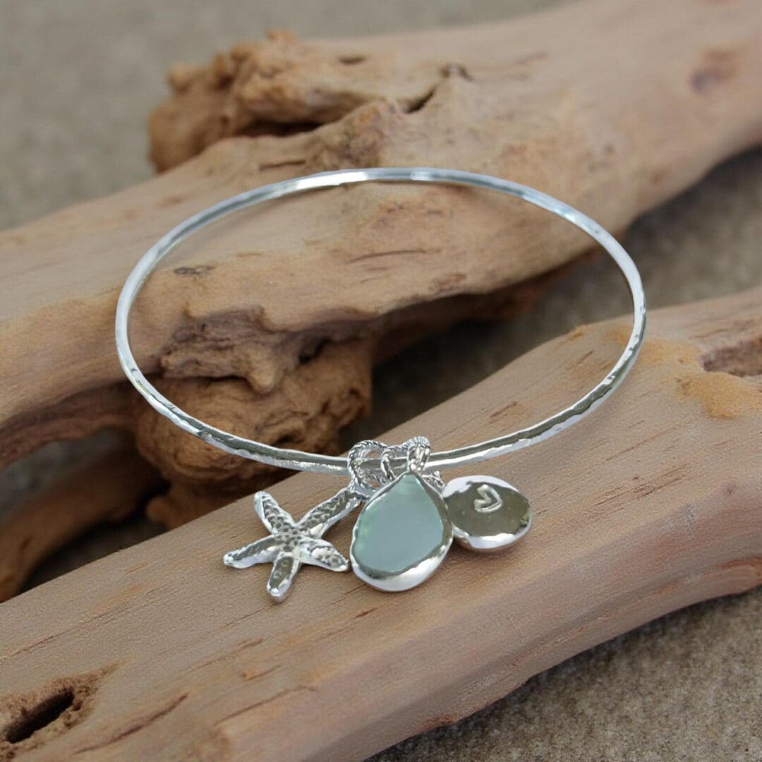Coastal Silver Bangle With Charms