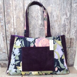 Purple floral tote with a large font pocket