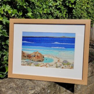 Framed print of original embroidery of a rockpool on sandy beach total size 44 x 34cm