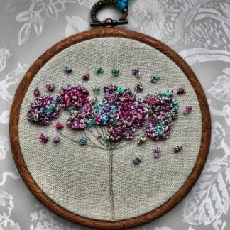 Pastel coloured beaded Cow parsley on a 4" embroidery hoop