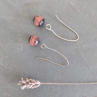 Handmade acorn inspired recycled copper with pink lava rock bead drop earrings. Finished with silver earwires