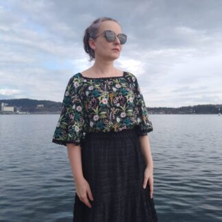 floral blouse with fluted sleeve and square neck with black lace edging