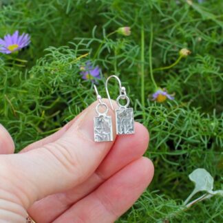 Silver textured drop earrings