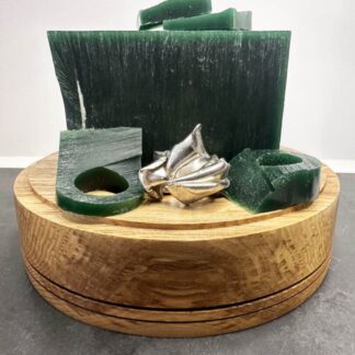 Large sculpted wax carved Silver ring frontal sitting with green jewellers wax
