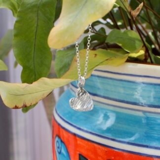 Curved silver heart pendant necklace