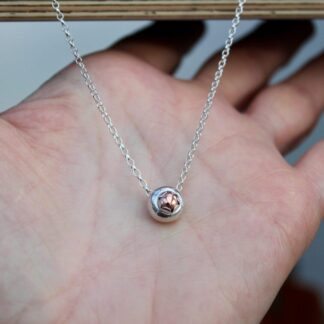 Silver and copper domed flower pendant necklace