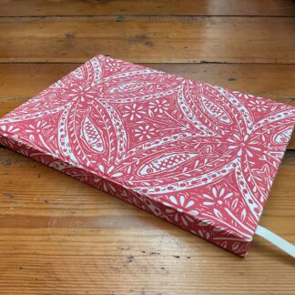 A5 Handmade Notebook with lined paper covered in a salmon pink fabric