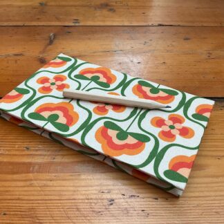 Handmade Jotter Pad with pencil covered in a retro print fabric