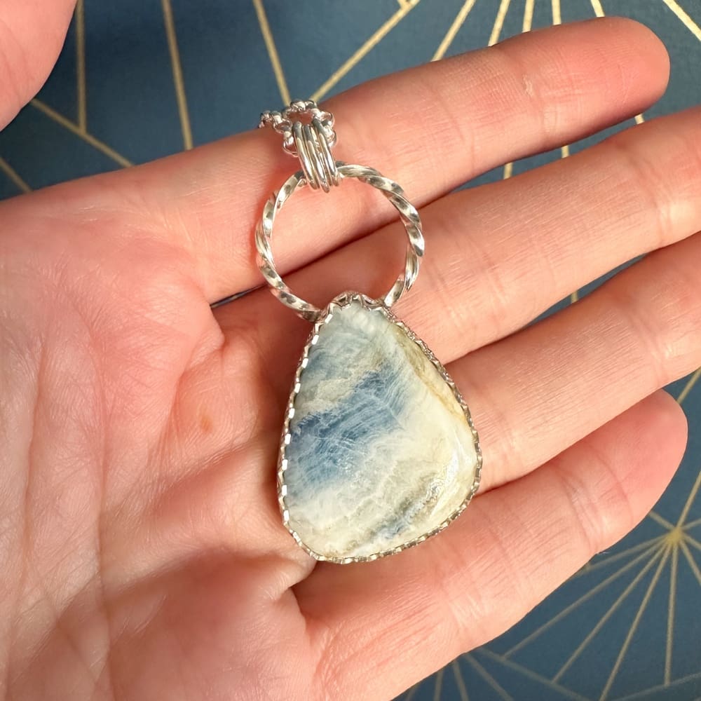 Blue and white scheelite gemstone necklace inspired by the Norwegian Fjords