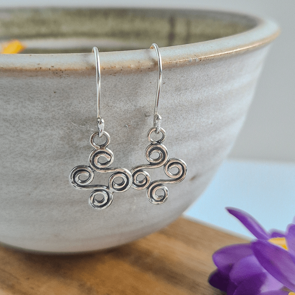 Small pair of double ended spiral earrings made from sterling silver