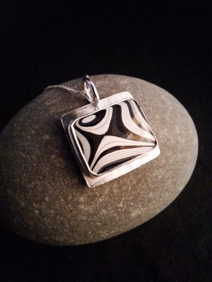 Monochrome Fordite and Silver Pendant