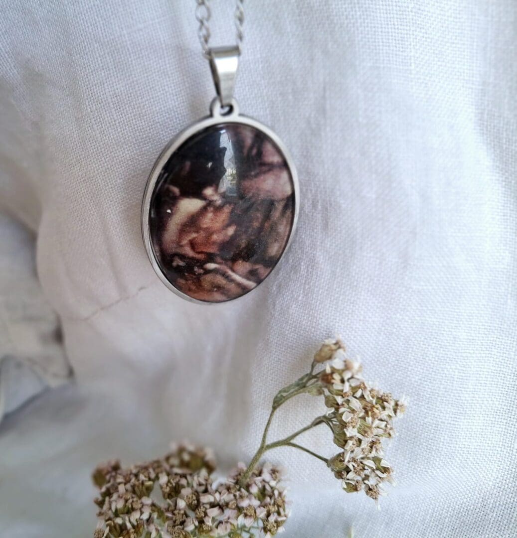 Stainless steel necklace with oval pendant - Midnight bloom collection