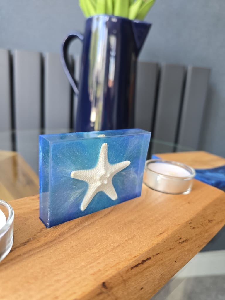 Starfish Resin Tealight Holder on Glass Table with Vase