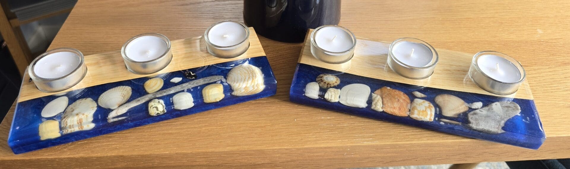 Shell and Driftwood Resin Tealight Holders on Wooden Table