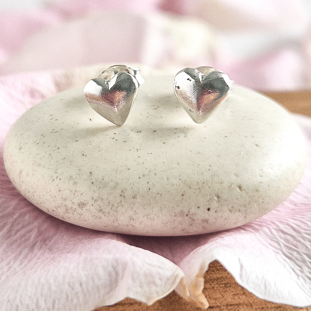 Style C features smooth, slightly raised little heart-shaped studs.