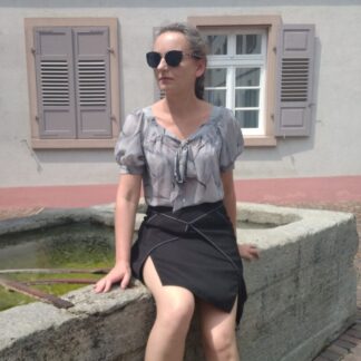 elegant blouse with short puffy sleeve and black pencil skirt with splits