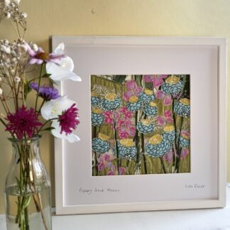 Textile art of colourful poopy seedheads and flowers in frame