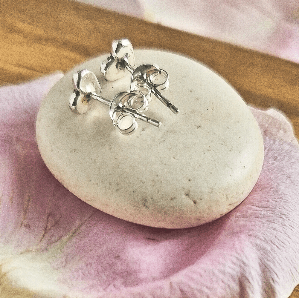 Photo shows the stud earring mechanism at the back of the hearts.