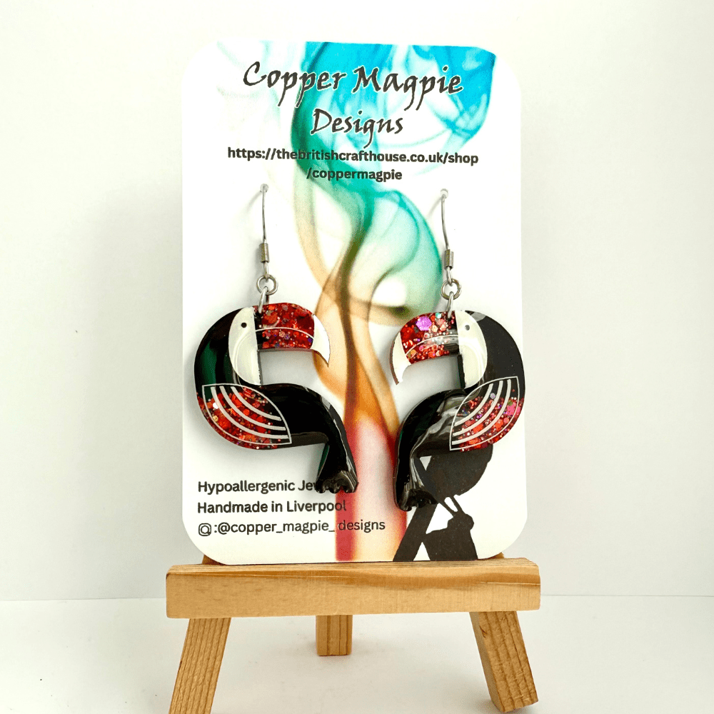 Fun and quirky tropical toucan earrings, perfect for summer festivals or gifts.