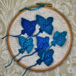 6" Embroidery Hoop with 6 different stingrays in shades of blue thread