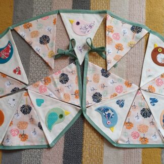 Birdie bunting featuring multicoloured birds with trees fabric made by lyndawilcansew