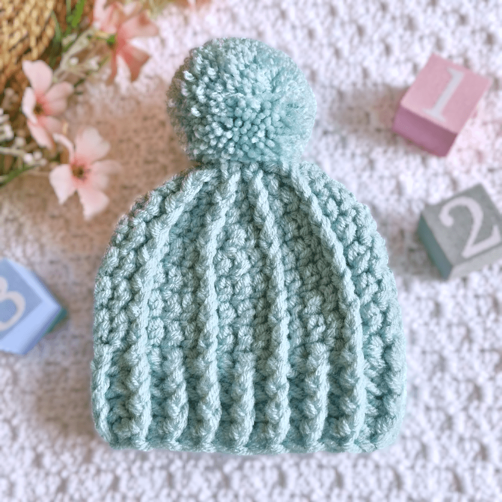 Chunky crochet pom pom hat, soft and cosy, sizes from newborn to large adult