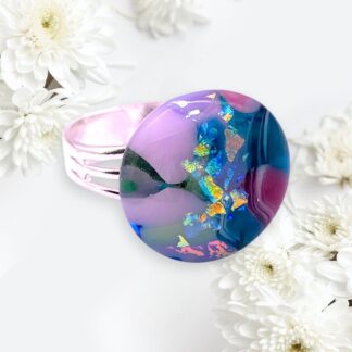 Add sparkle to your style with this handmade dichroic glass ring featuring a vibrant mosaic design. Adjustable band for a perfect fit!