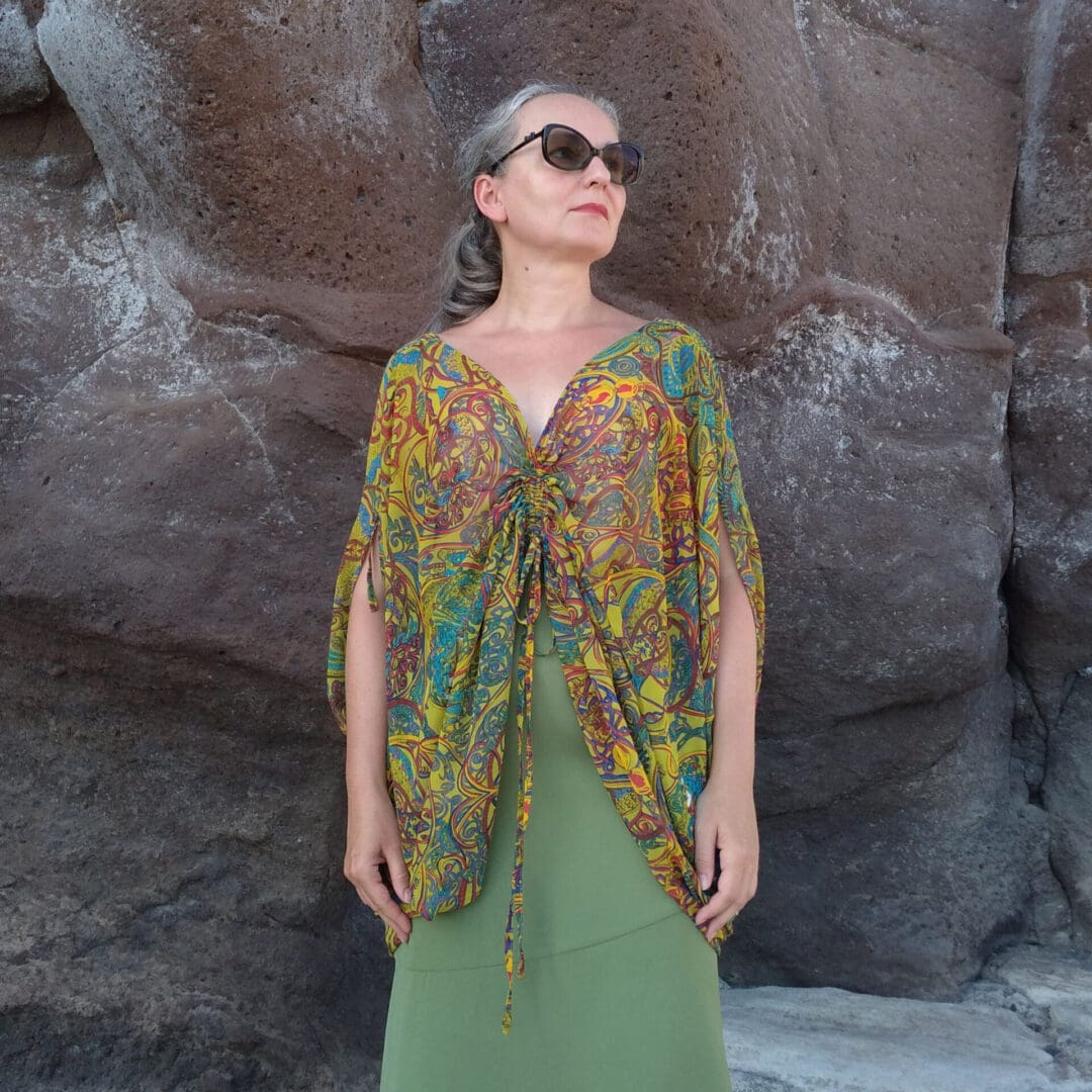 woman wearing drawstring top shaped like butterfly