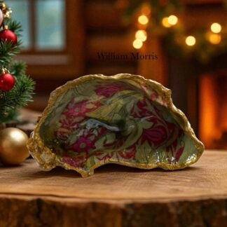 A handmade decoupaged oyster featuring a lovely William Morris design.
