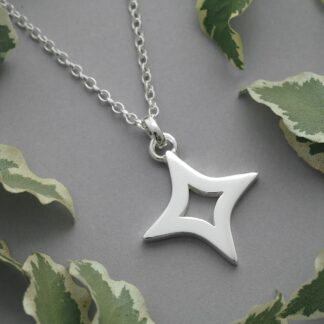 Handmade sterling silver 4-point star pendant necklace – curved edge design, 2cm wide, crafted in the UK
