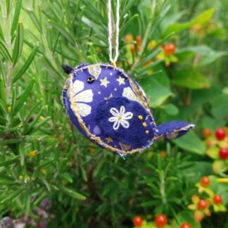 a hand stitched midnight blue felt and fabric bird decoration
