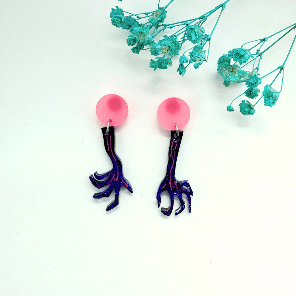 "Handmade pink and purple zombie claw earrings with frosted pink studs for Halloween gothic style