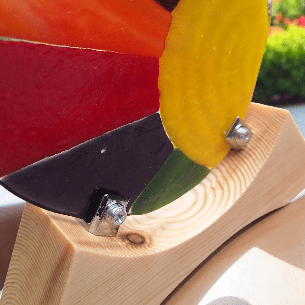Handmade fused glass sunrise ornament with wooden stand - Image 5