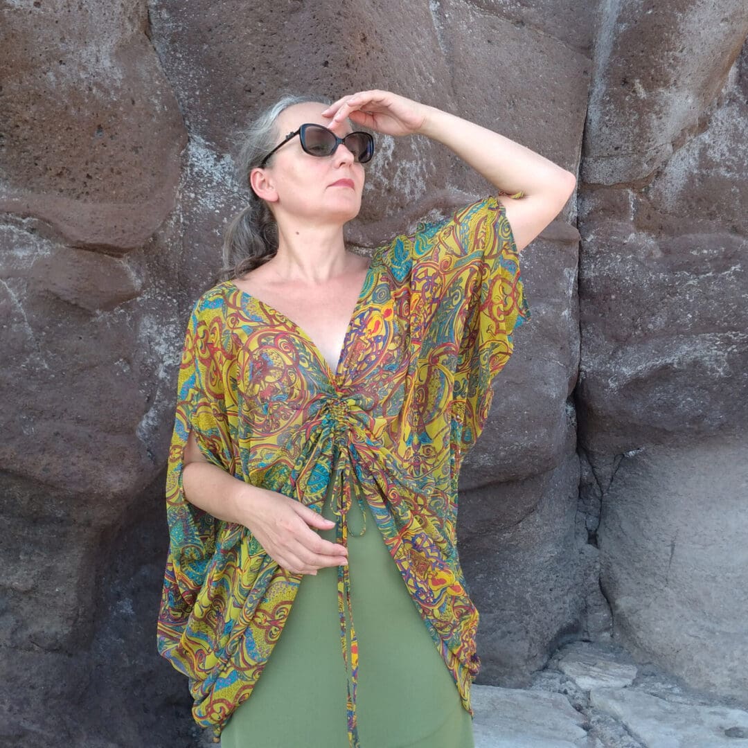 woman wearing loose tunic top with drawstring