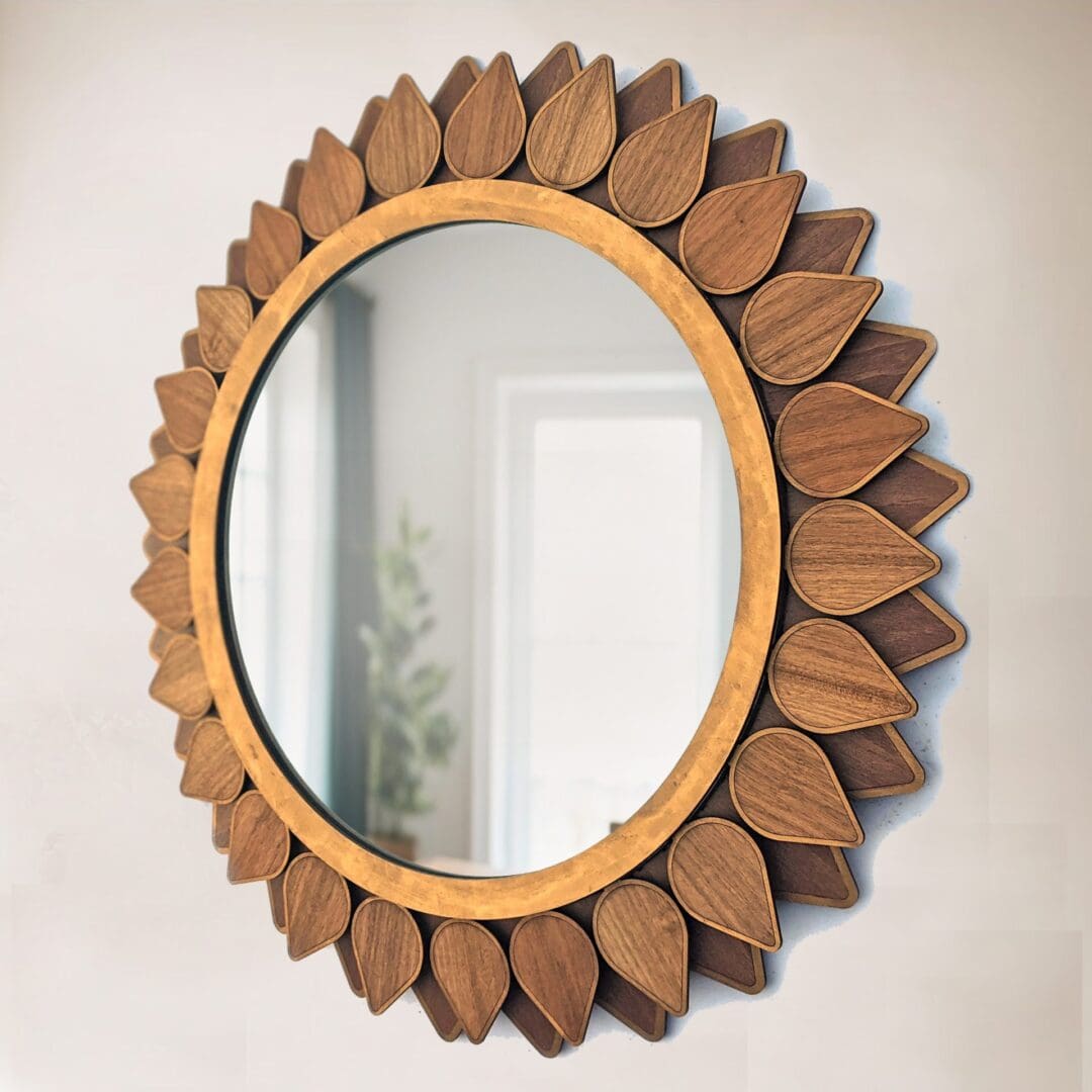 Round mirror made from walnut wood.