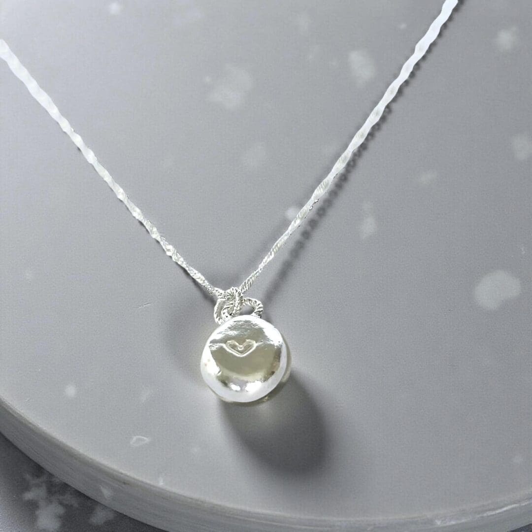 Delicate Silver Heart Charm Necklace