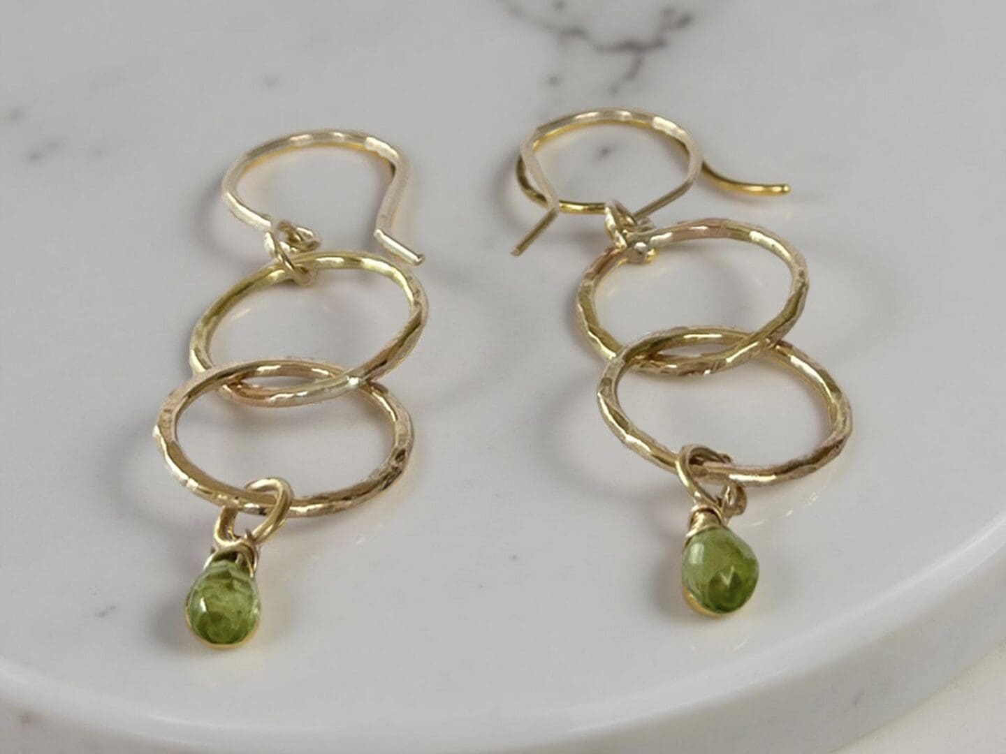 Gold Hoop Earrings With Peridot Gemstones - Image 4
