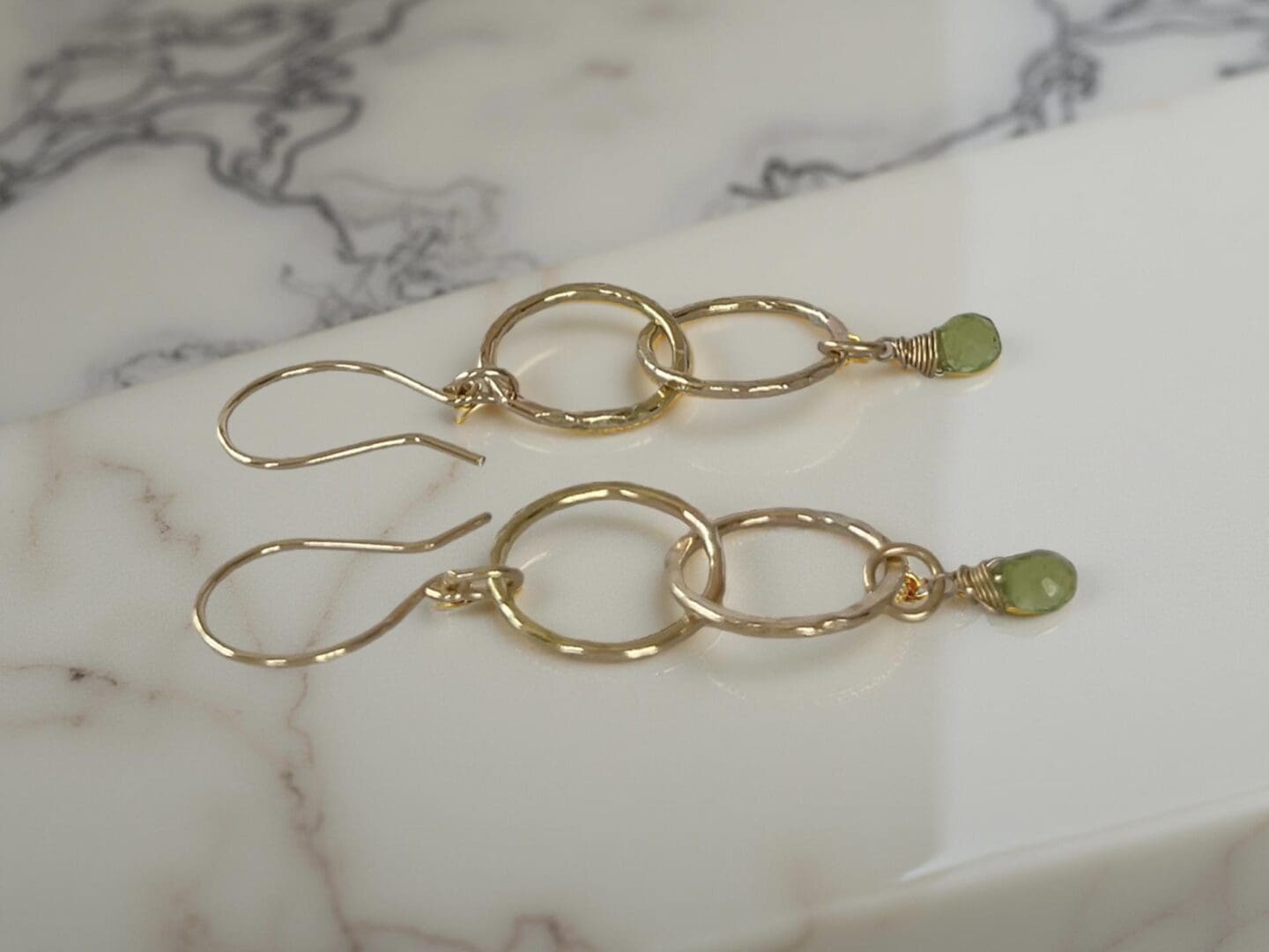 Gold Hoop Earrings With Peridot Gemstones - Image 3