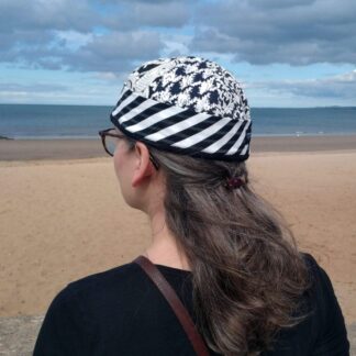 black and white hat made from recycled fabrics