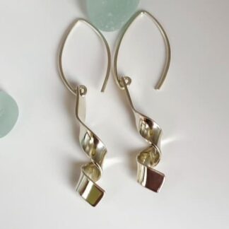 Silver ribbon effect earrings