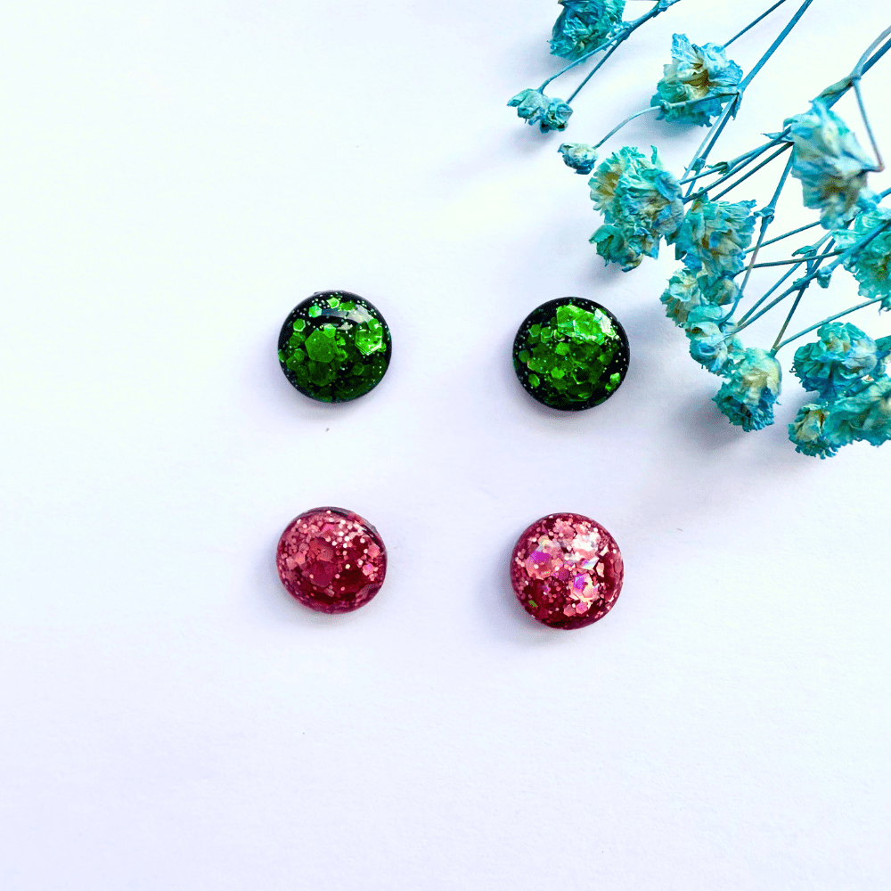 Handmade emerald green glitter resin stud earrings and pink glitter resin stud earrings with hypoallergenic surgical steel pin and back – bold and sparkly