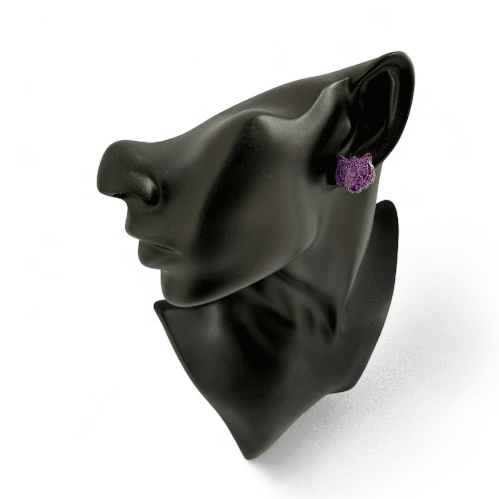 Purple tiger studs on a bust model showing size in ear as a large statement stud