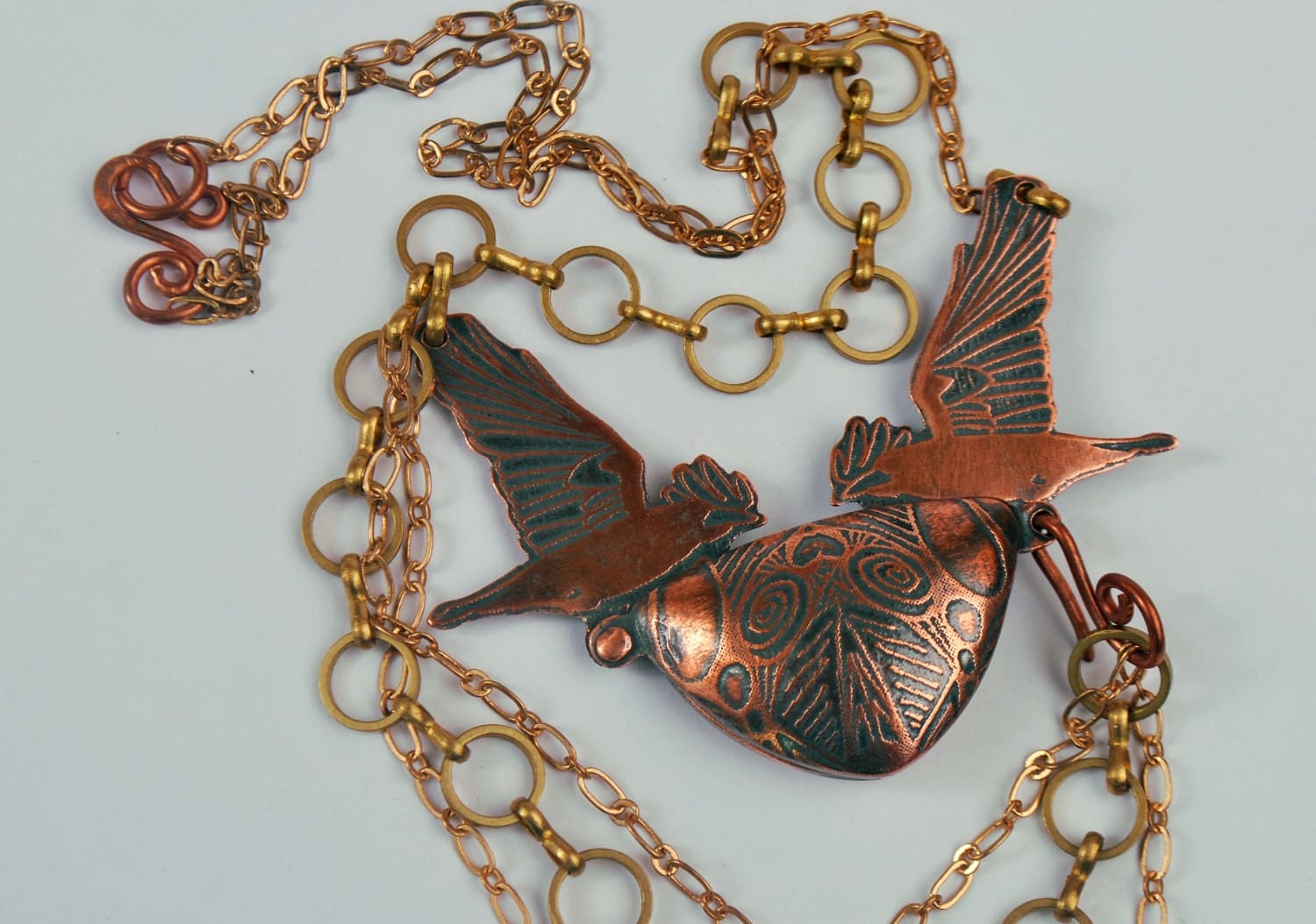 Crow Talisman Locket in Copper with swivel opening