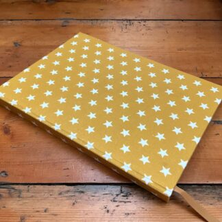 A5 handmade journal with lined paper and starry mustard fabric